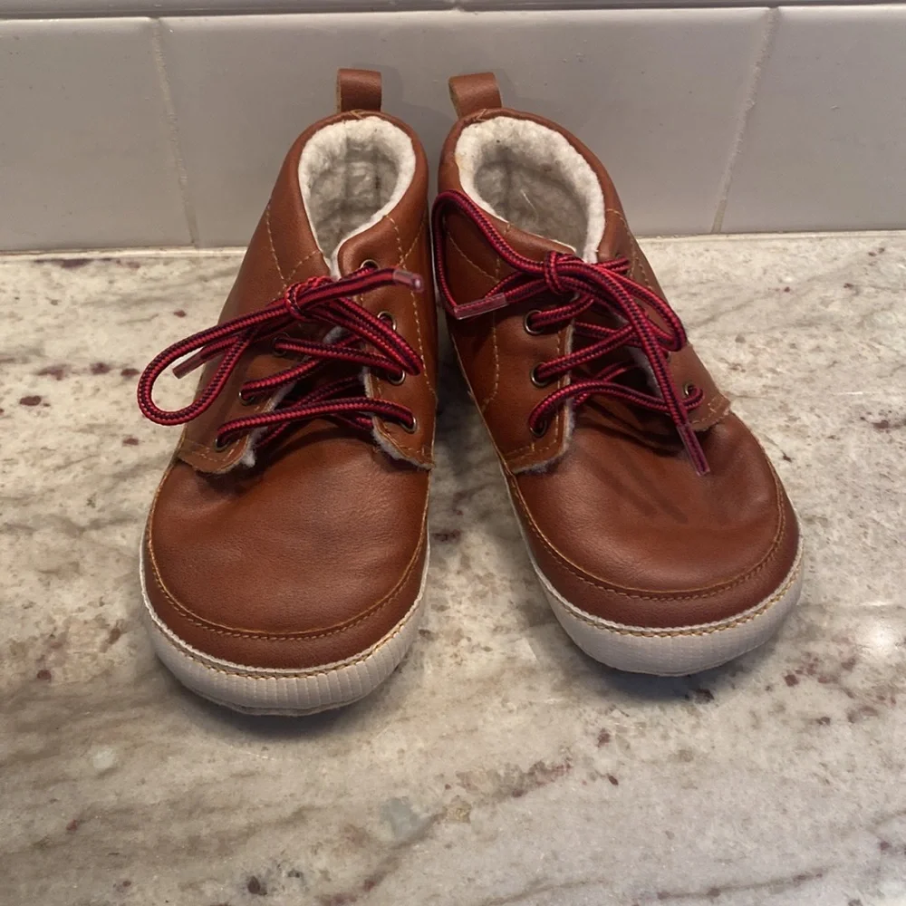 Baby Gap size 18-24 months brown bootie with Sherpa lining. Red laces. Like new
